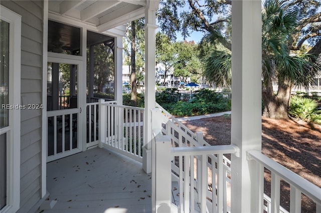 view of patio / terrace featuring a sunroom