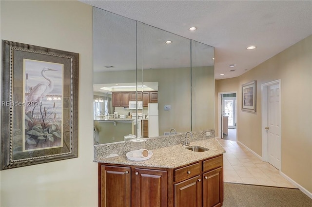 bathroom featuring vanity and tile patterned floors