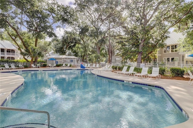 view of swimming pool featuring a patio area