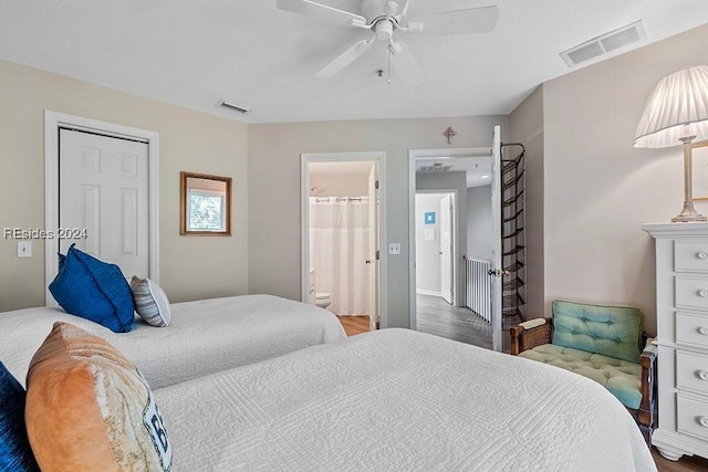 bedroom featuring ceiling fan and ensuite bath