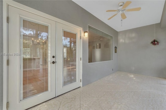 interior space featuring ceiling fan