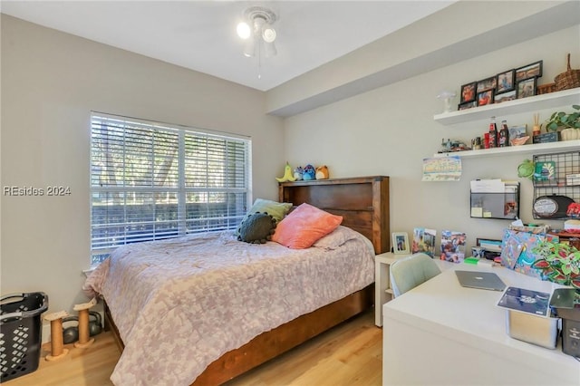 bedroom with light wood-type flooring