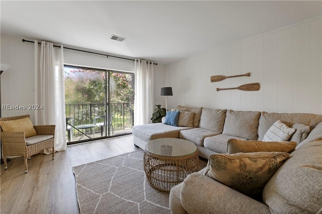 living room with light hardwood / wood-style floors