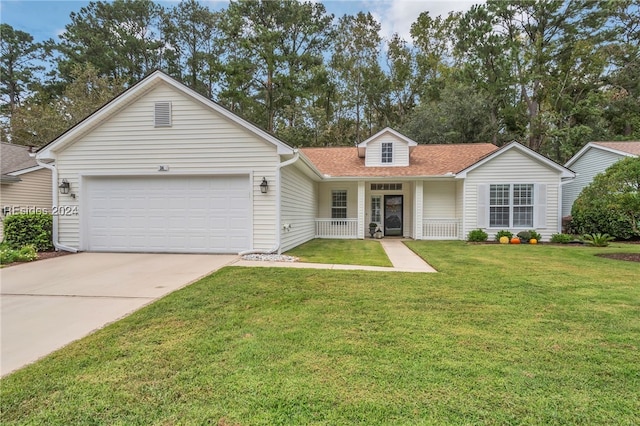 single story home featuring a garage and a front yard