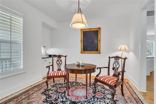 sitting room featuring light hardwood / wood-style flooring