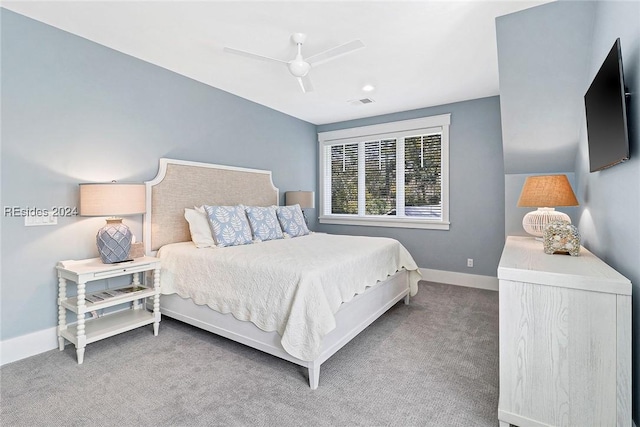 carpeted bedroom featuring ceiling fan