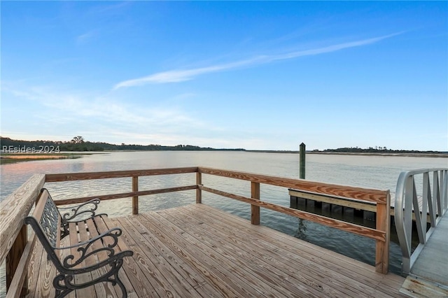 view of dock with a water view