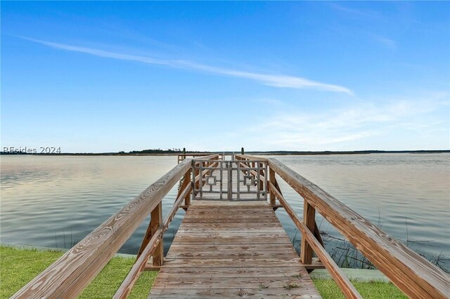 view of dock with a water view