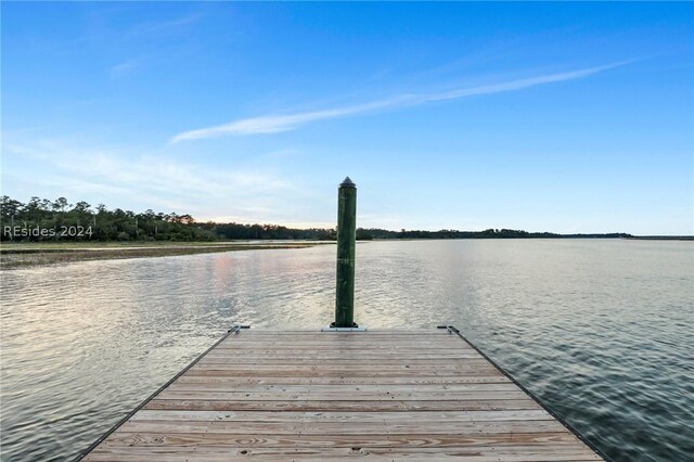 view of dock with a water view