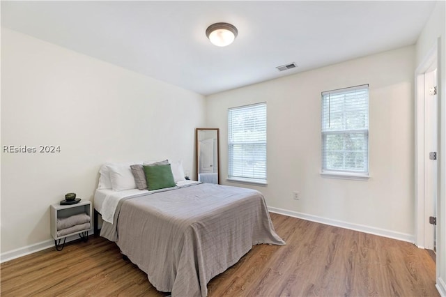 bedroom featuring light hardwood / wood-style floors