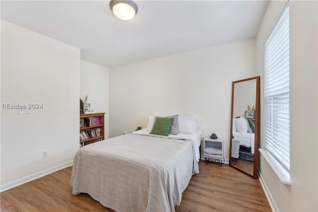 bedroom featuring light hardwood / wood-style flooring