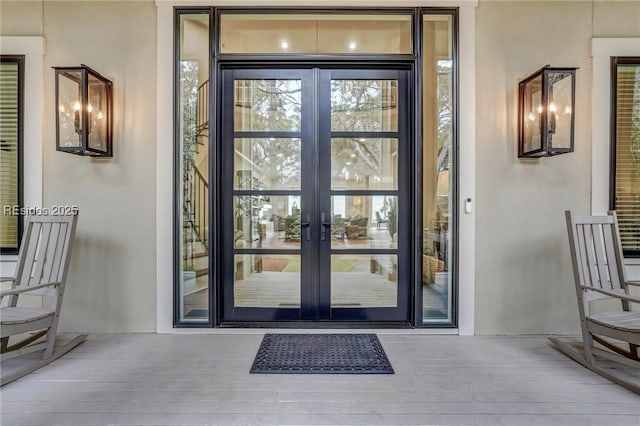 entrance to property featuring french doors