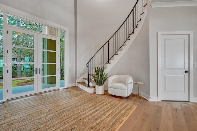 interior space featuring light hardwood / wood-style floors and french doors