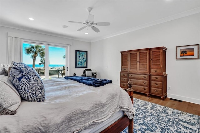 bedroom with dark hardwood / wood-style floors, ceiling fan, access to exterior, and crown molding