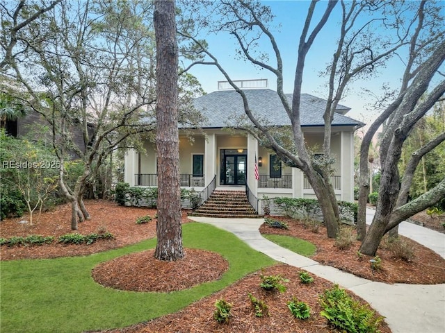 view of front of home featuring covered porch