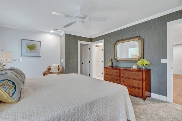 bedroom with crown molding, light colored carpet, and ceiling fan