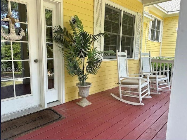 wooden terrace with covered porch