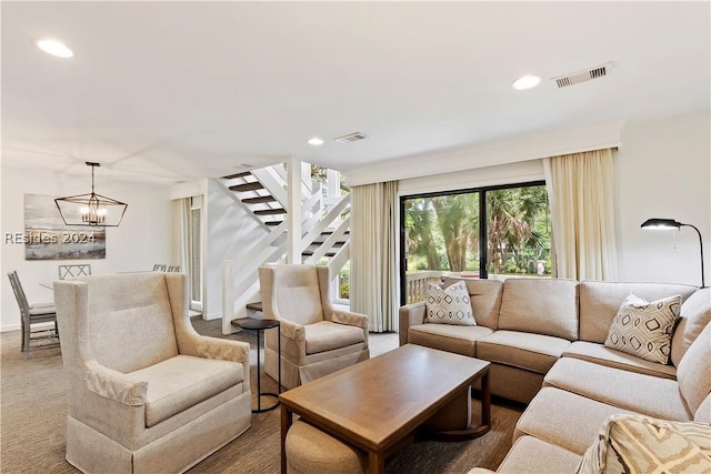 living room with an inviting chandelier