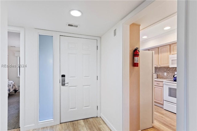 hall featuring light wood-type flooring