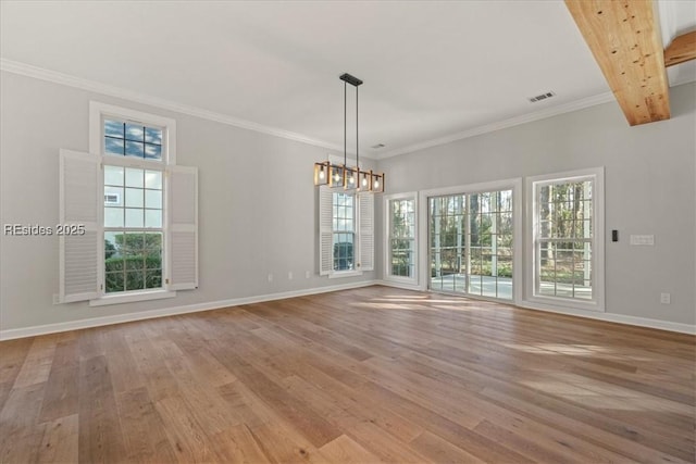 interior space featuring a notable chandelier, beam ceiling, ornamental molding, and light wood-type flooring