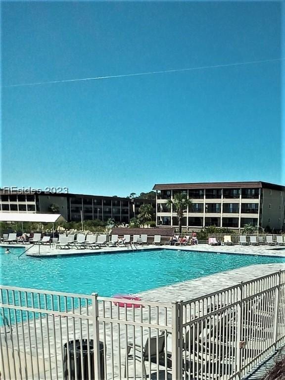 view of pool featuring cooling unit