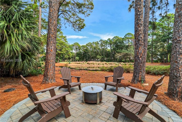 view of patio featuring a fire pit