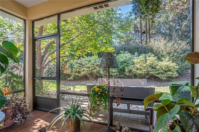 unfurnished sunroom featuring plenty of natural light