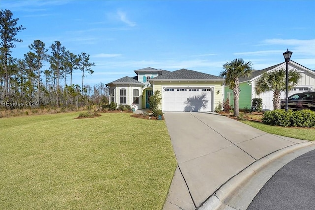 view of front of home with a garage and a front lawn