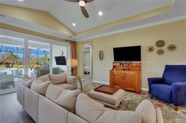 living room with ornamental molding, vaulted ceiling, light hardwood / wood-style floors, and ceiling fan