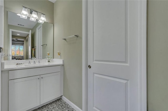 bathroom featuring vanity and tile patterned flooring