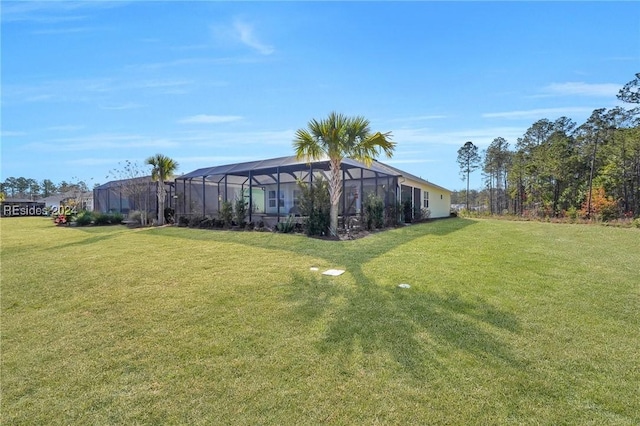 view of yard with a lanai