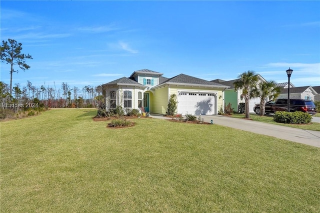 view of front of property featuring a garage and a front lawn