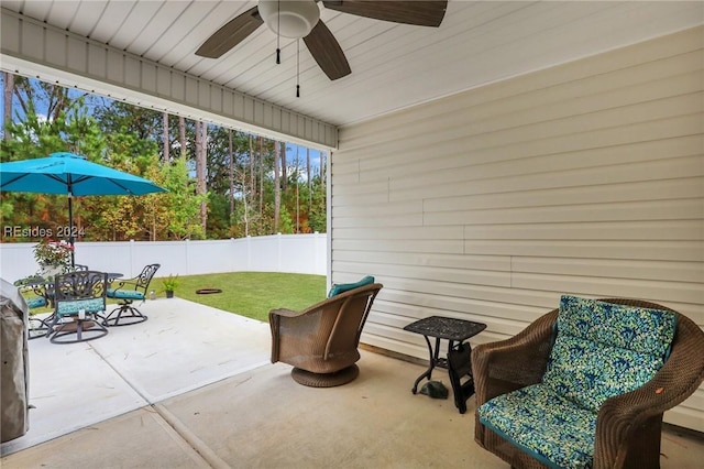 view of patio / terrace featuring ceiling fan