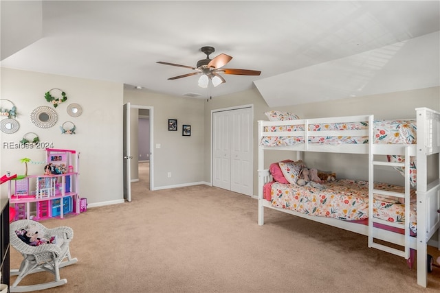 bedroom with carpet flooring, ceiling fan, and a closet