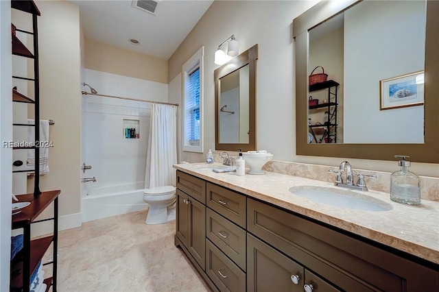 full bathroom with vanity, toilet, and shower / bath combo with shower curtain