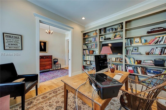 living area featuring an inviting chandelier and hardwood / wood-style flooring