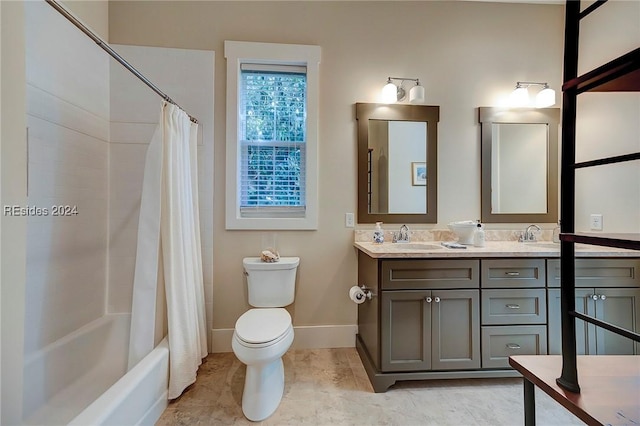 full bathroom featuring shower / tub combo with curtain, vanity, and toilet