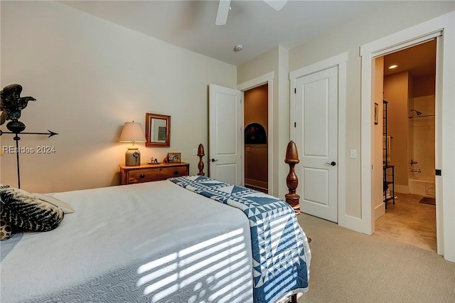 bedroom featuring ceiling fan and light colored carpet