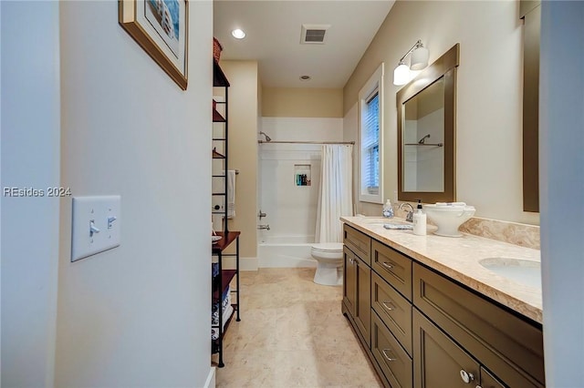 full bathroom featuring vanity, toilet, and shower / bath combo