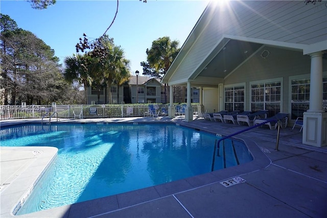 view of swimming pool with a patio