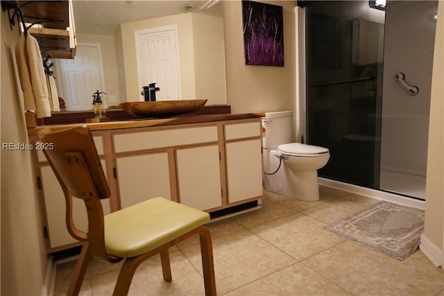 bathroom with walk in shower, vanity, toilet, and tile patterned flooring