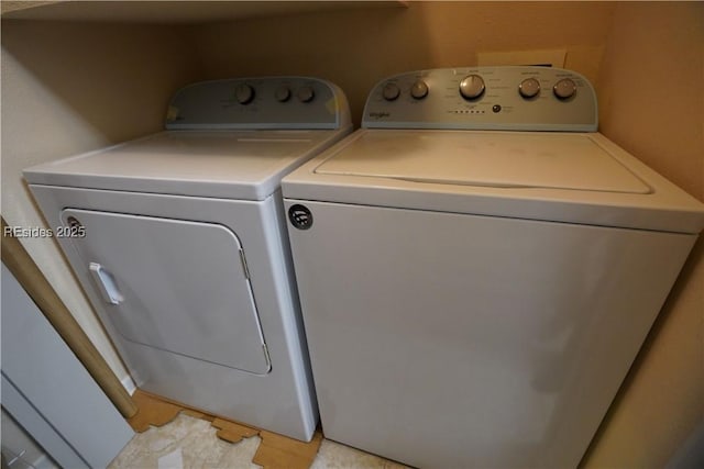 washroom with washer and clothes dryer