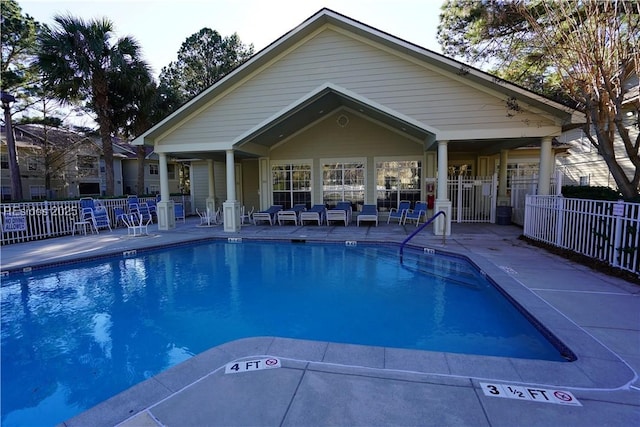 view of swimming pool with a patio