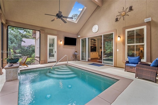 view of pool with a skylight