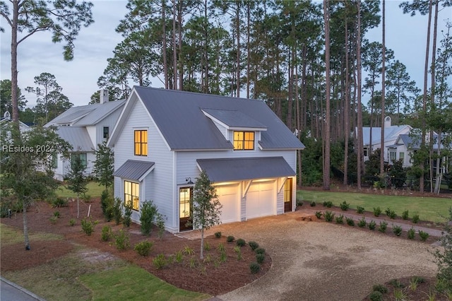 view of property exterior with a yard and a garage