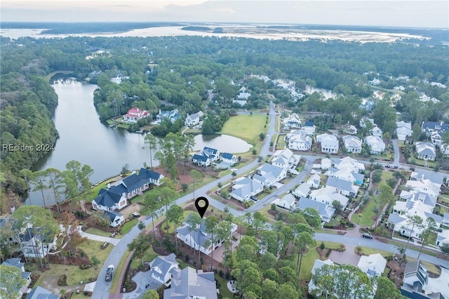 bird's eye view with a water view