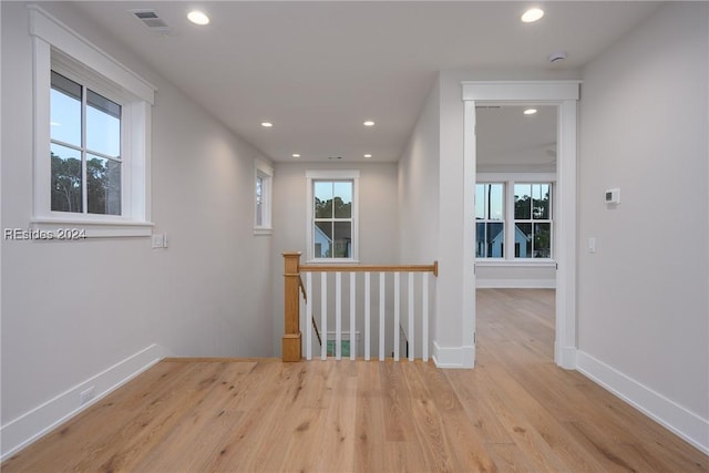 hallway featuring light hardwood / wood-style flooring