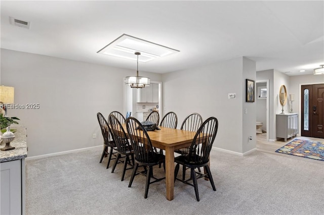 view of carpeted dining room