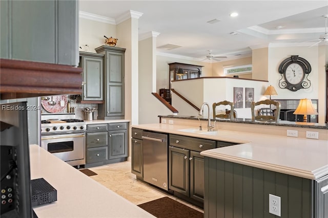 kitchen with crown molding, ceiling fan, appliances with stainless steel finishes, and sink