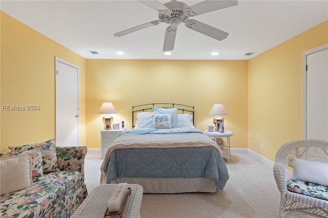 carpeted bedroom featuring ceiling fan